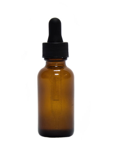 Lemongrass Oil in glass bottle with dropper in